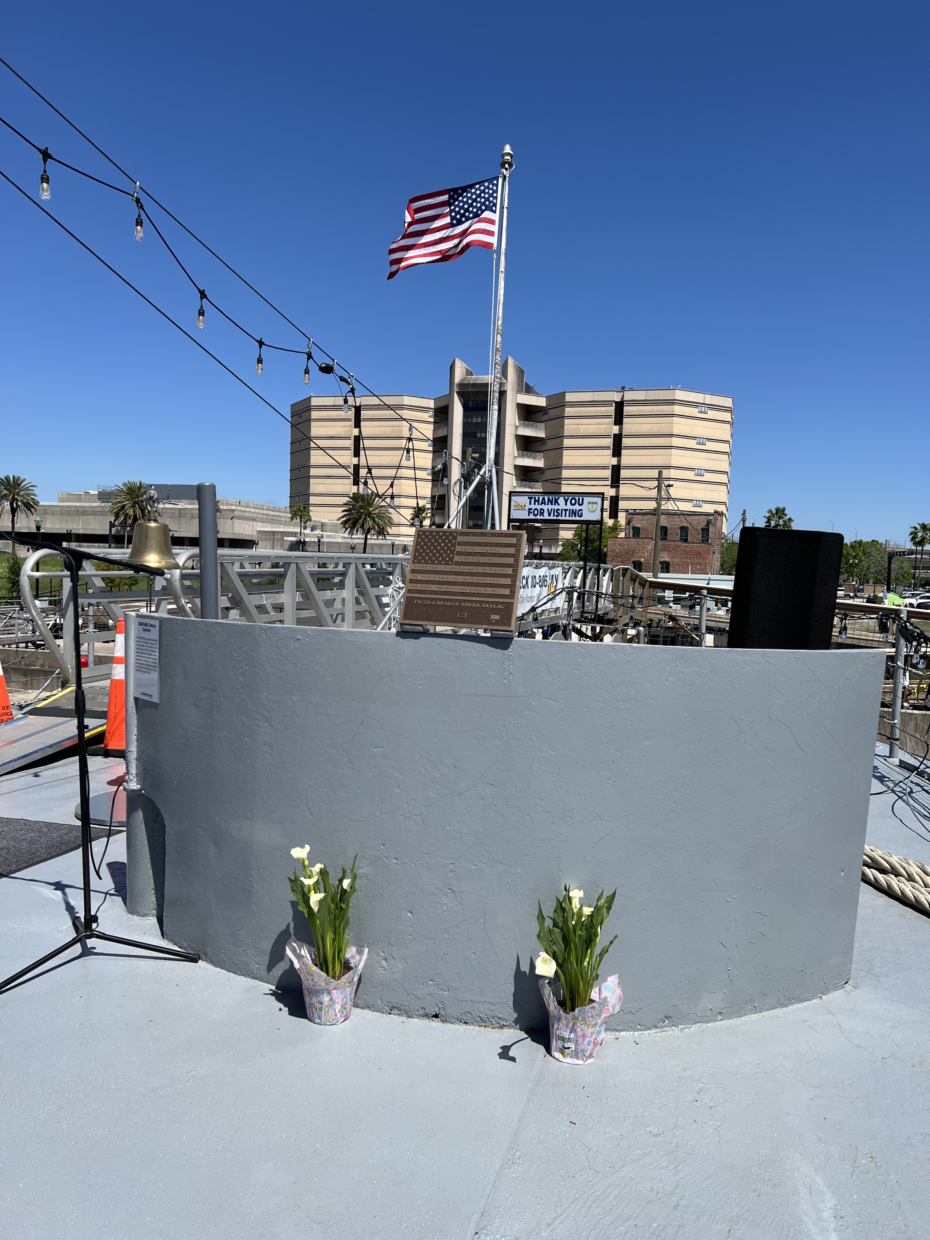 USS Orlick Braille Flag Below Ensign